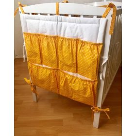 Napsárga színű zsebes tároló kiságyra 